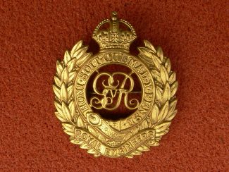 11. Cap Badge.