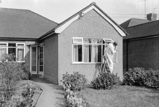 Peter's father painting windows at 16 Selbourne Road | Peter Houghton