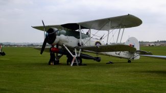 Swordfish aircraft at Duxford Sept 2011, the torpedo can be clearly seen slung below the plane, and the observer's machine gun is at the rear of his seat. This one flew in as part of the display for Duxford's flying day. | Dave Cowan