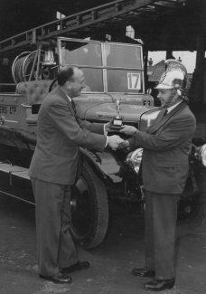 Presentation of the Concours d'elegance, London-Brighton Rally 1961 by Bill Holtham at Essex Carriers Ltd, Tarpots Presentation of the Concours d'elegance, London-Brighton Rally 1961 by Bill Holtham at Essex Carriers Ltd, Tarpots | National Benzole
