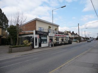 Hart Road 2013. Still a barbers shop after all these years but in the 50s/60s it was called Jock's Barber shop. The large shop to the right used to be Partridge's. | Eileen Gamble