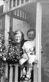 Susan Sumner, Allan's Grandmother, holding Allan Gaines on the porch of 'Surene' | Surene Collection, Pamela-Jeanetta Bird Gaines