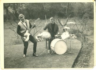 Alan on guitar, Fred on drums. The clothes are typical of the early 1960s, including winkle picker shoes. | Harry Emery