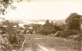 Station Road. The Parkers' Cottage is on the right | R.F. Postcards