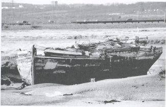 Abandoned spritsail barge Abandoned spritsail barge