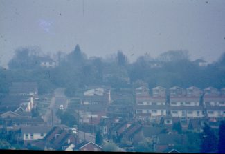 Photo taken late 1970s from the footpath on Boyce Hill Golf Course, looking up Hill Road.  The white house top left  is 'Jarvis Hall'. | Harry Emery