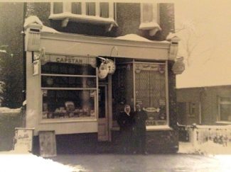 Bernard Hagon's father standing outside the Clock House with a customer. Taken in 1948. | Bernard Hagon