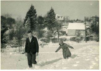 My brother Alan and me, probably taken in the late 50s, in the field opposite 'Lyndhurst'.  Bob and Nell Wood's bungalow is in the background. | Harry Emery