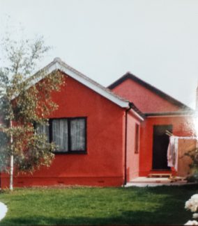 Back view of 'Manor Cottage' painted Cinnabar after the extension was added in 1985 | Pamela-Jeanetta Bird Gaines