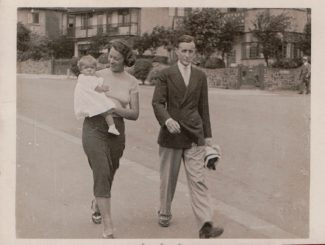 Marjorie and Kenneth Preston, Jill's parents. Marjorie holding Jill as they walk down Chalkwell Avenue on their way to the beach. Mid 1930s. | Jill Hair